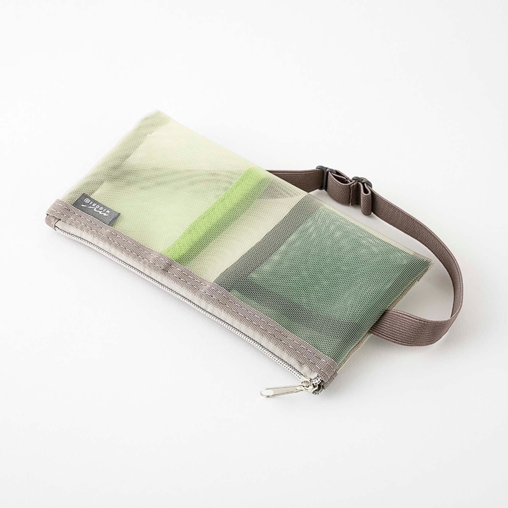 Kleine Tasche aus durchsichtigem Netzgewebe für Stifte und Kleinteile mit Gummiband zur Befestigung an einem Notizbuch oder Kalender