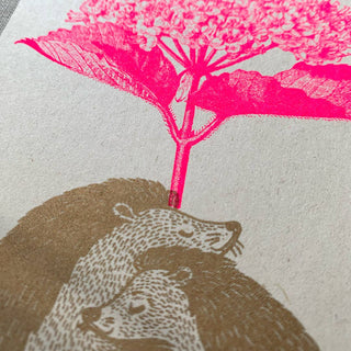 Risoprint in Gold und Fluo Pink